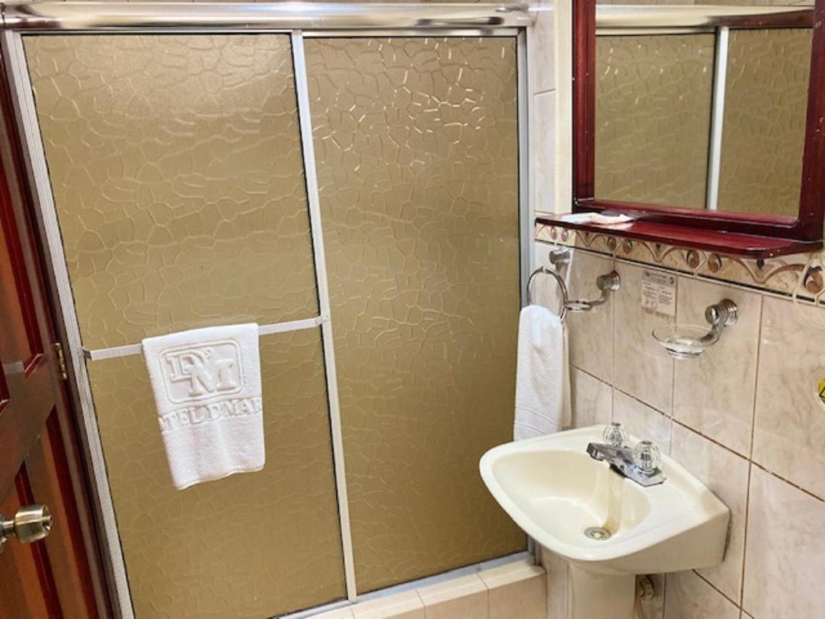 Hotel D'Mario Lago Agrio Bagian luar foto